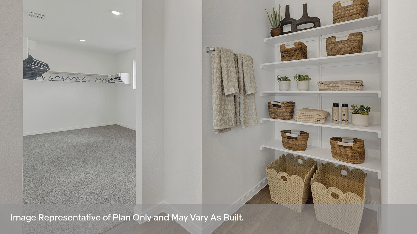 Main bathroom with wooden shelving and closet opeing.