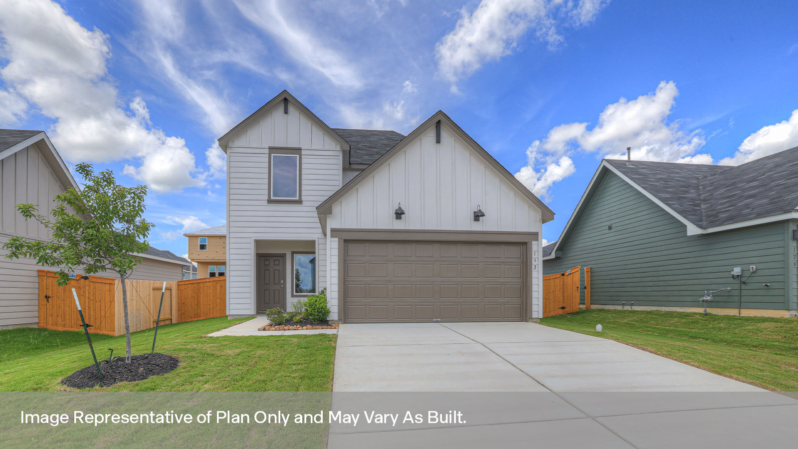 Two-story farmhouse exteriors with 2 car garage.