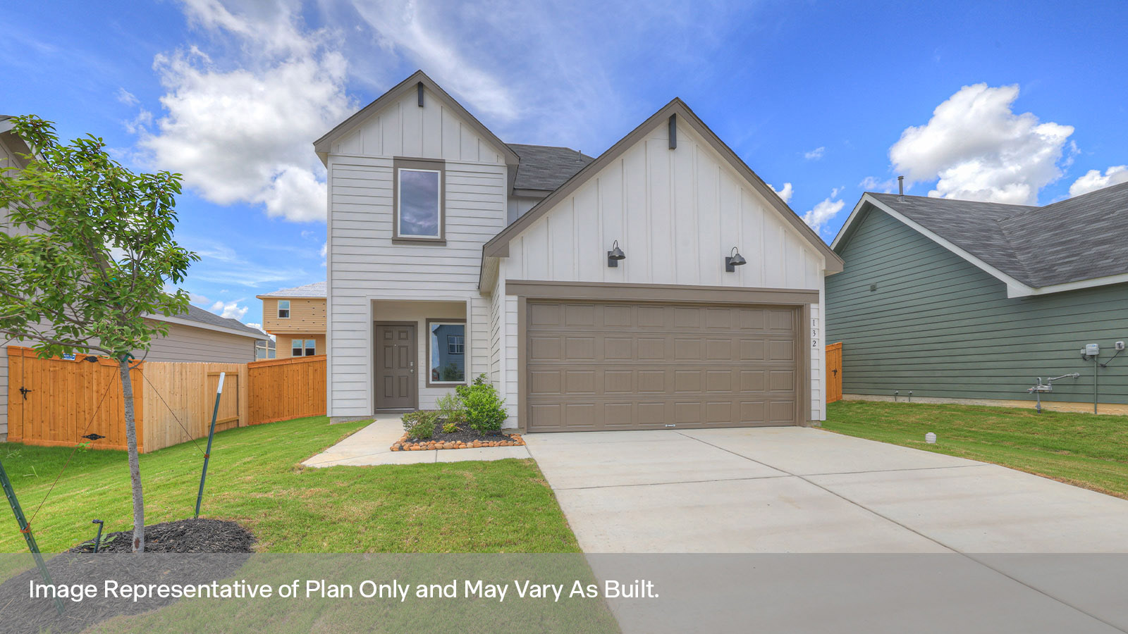 Two-story farmhouse exteriors with 2 car garage.