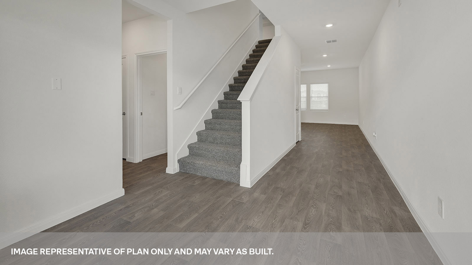 Entry hallway with stairs leading to the gameroom.