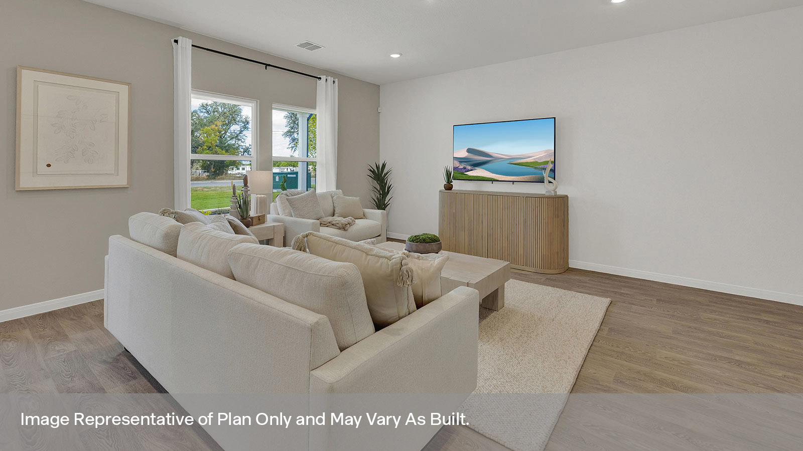 Living room with vinyl flooring and two windows opening to the kitchen.
