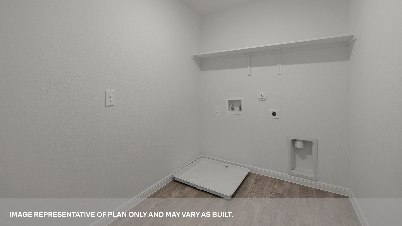 Laundry room with washer/dryer connections and wooden shelving.