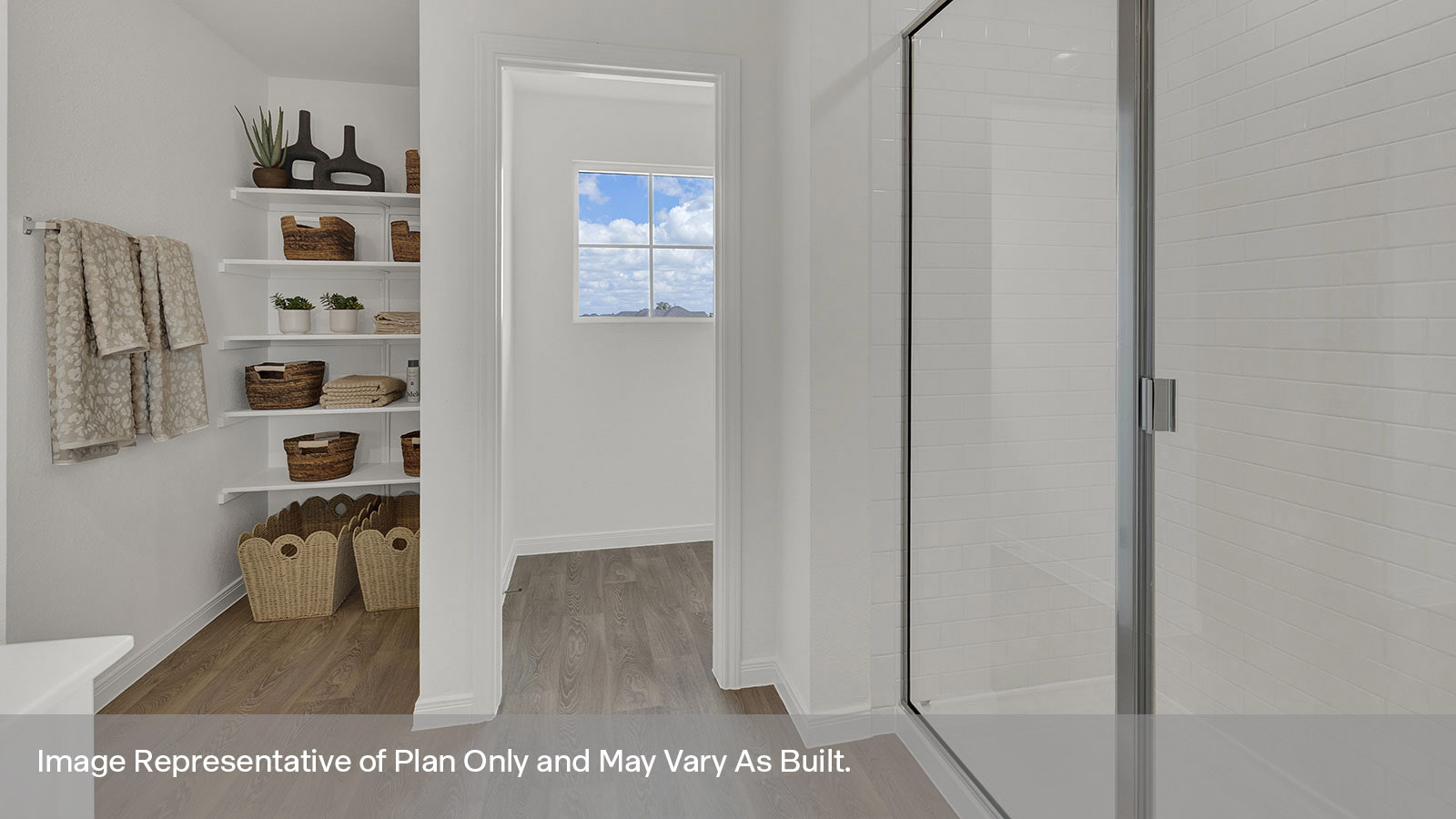 Main bathroom with stand in shower and shower glass door.