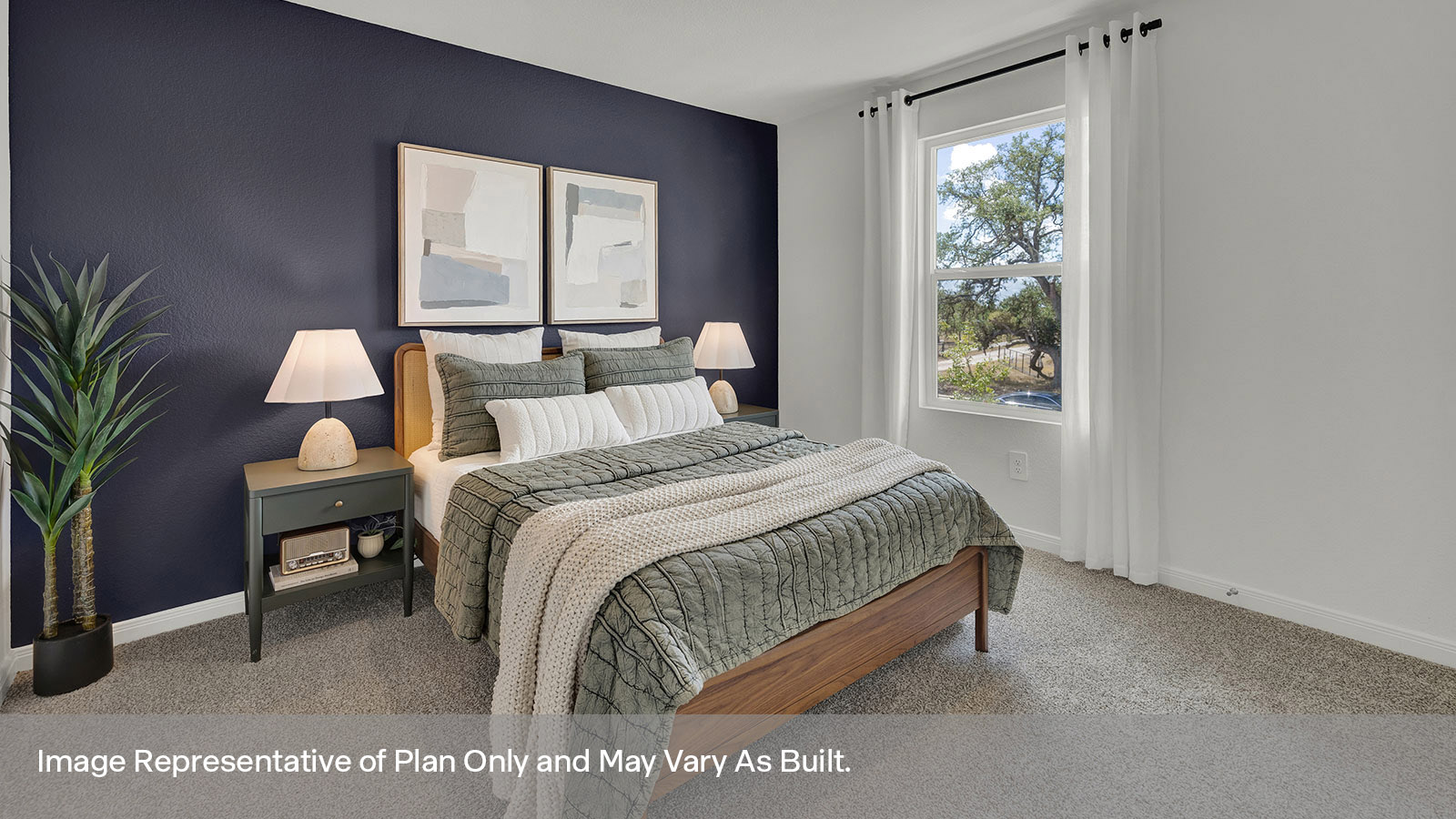 Bedroom with carpeting and one window.