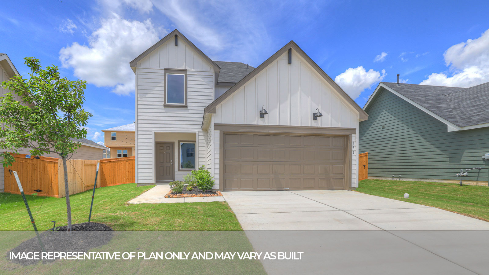 Nicole Floorplan with two windows and a two car garage.