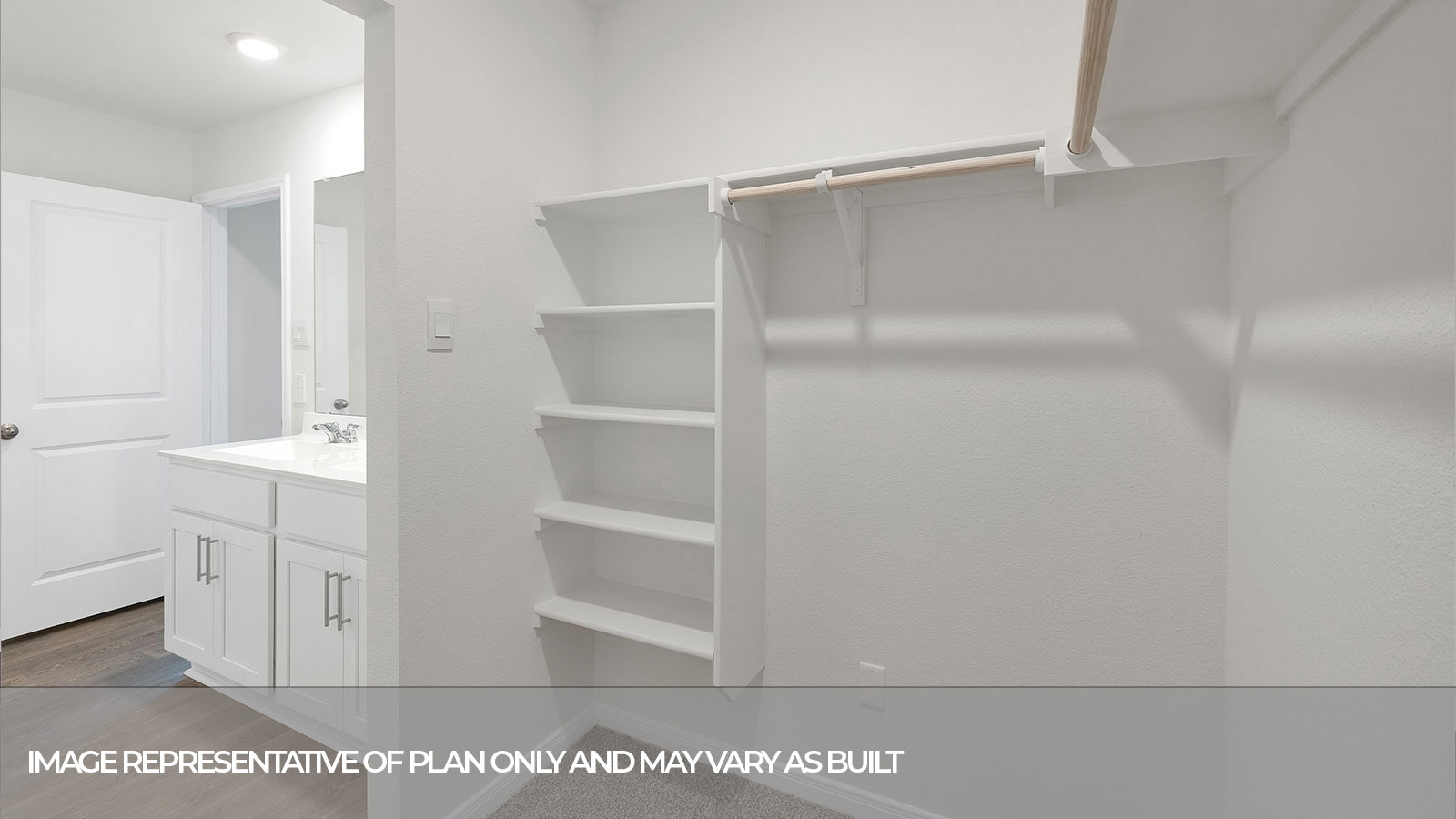 Large walk-in shower with glass door.