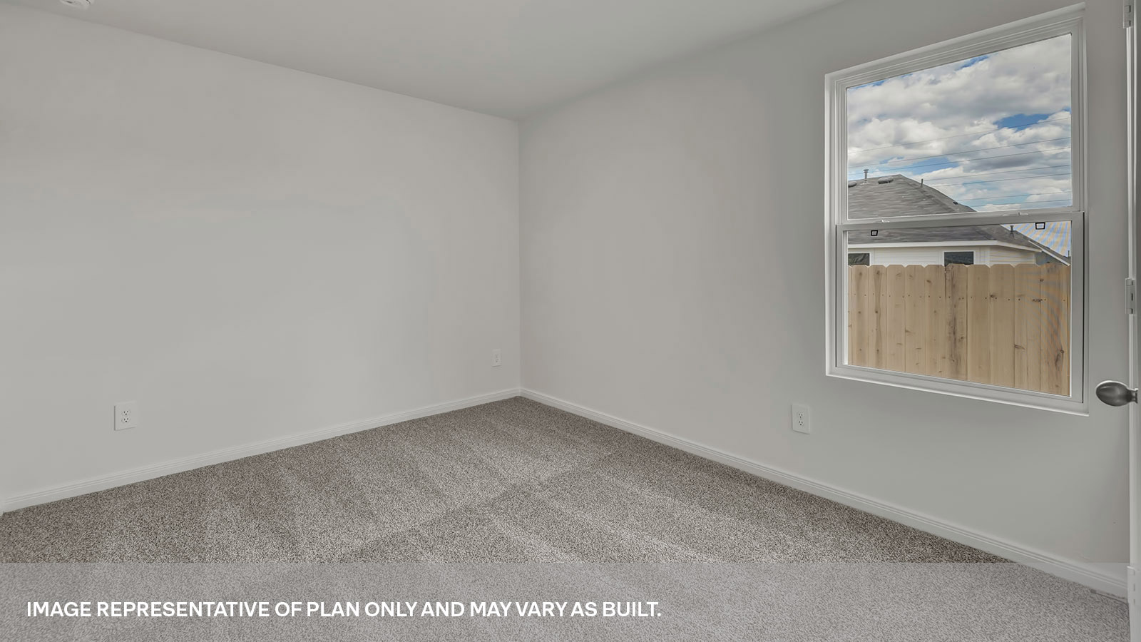 Second bedroom with carpeting and one window.