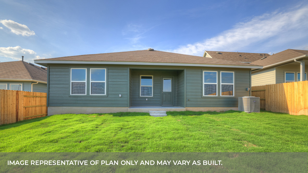 Covered patio with fully sodded backyard.