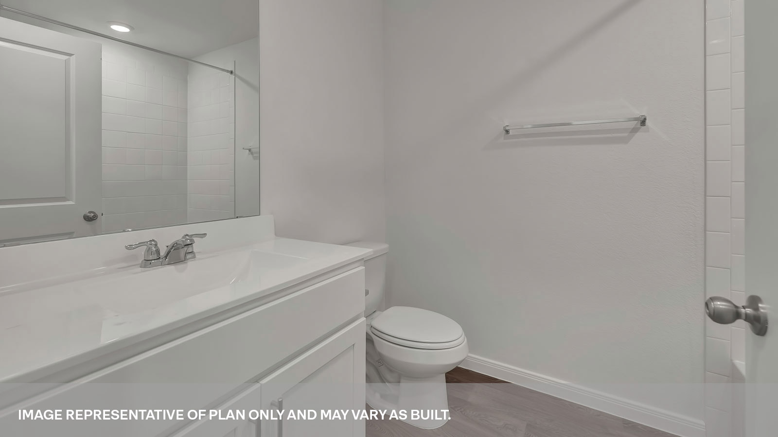 Hall bathroom with single sink vanity, toilet and shower tub