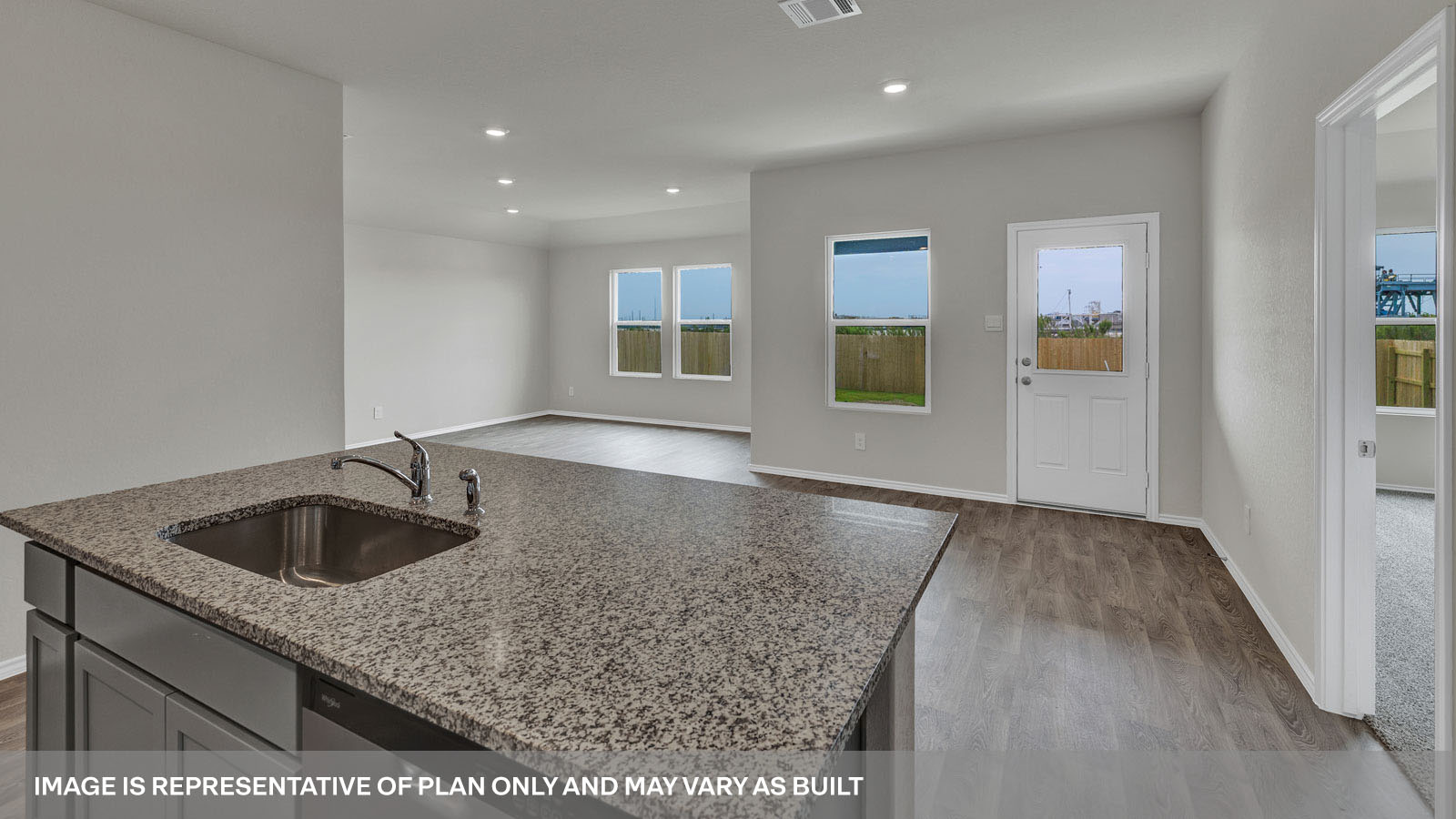 Kitchen island overlooking the dining room and living room.