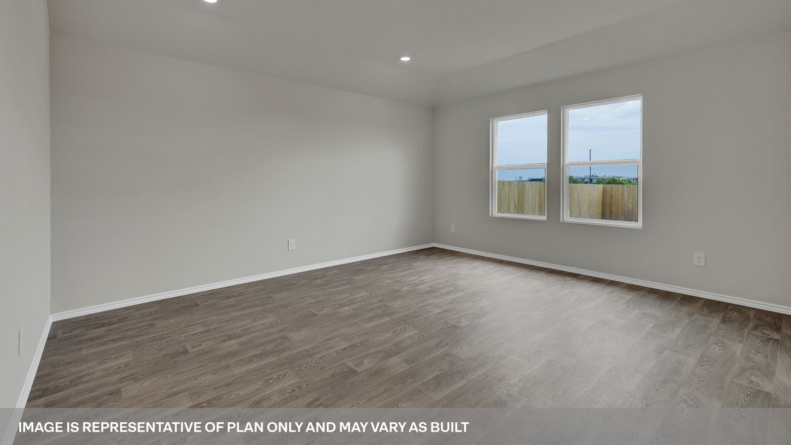 Living room and dining room with vinyl flooring 3 windows