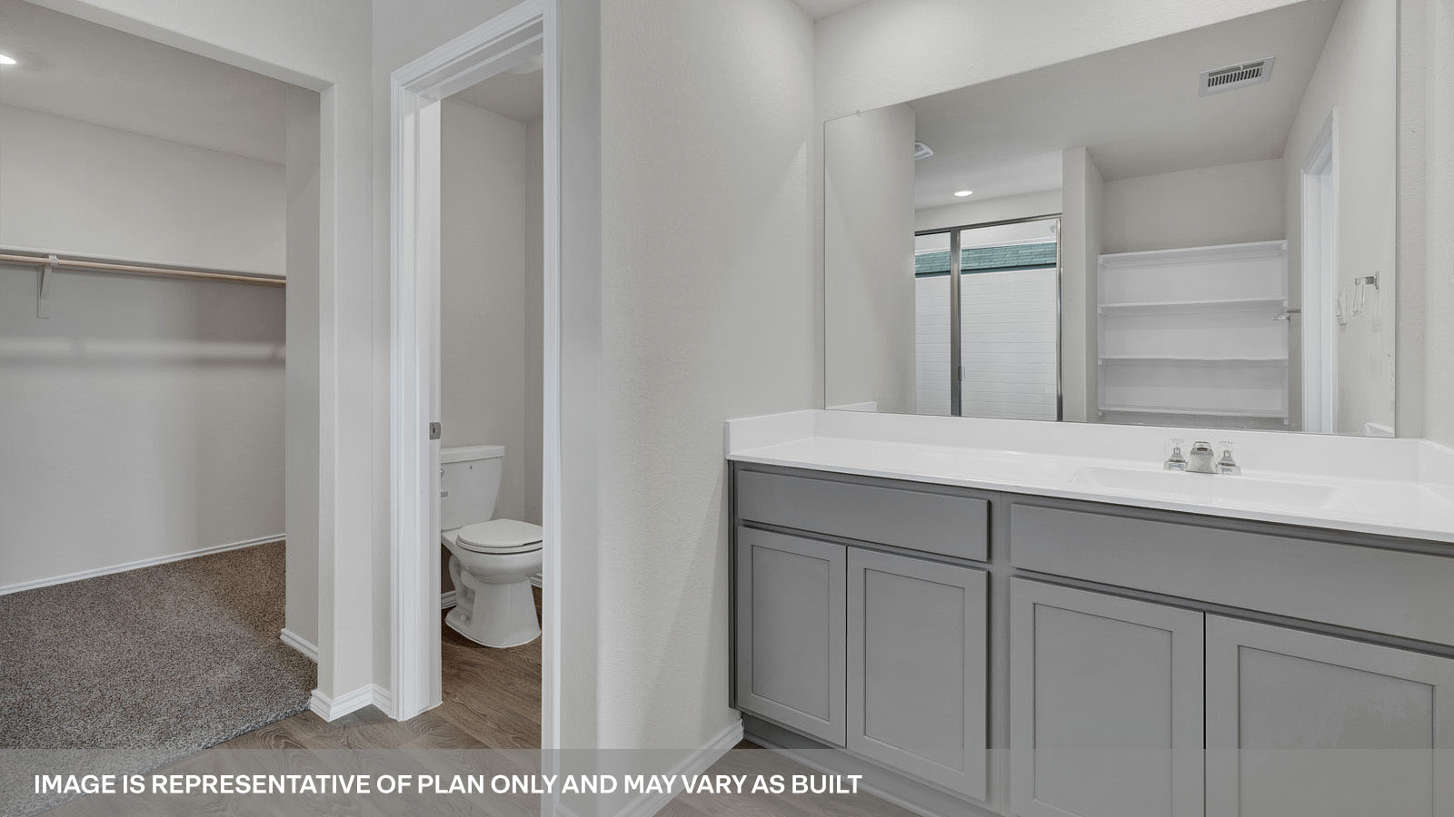 Main bathroom with double sink vanity, shower and wooden shelves.
