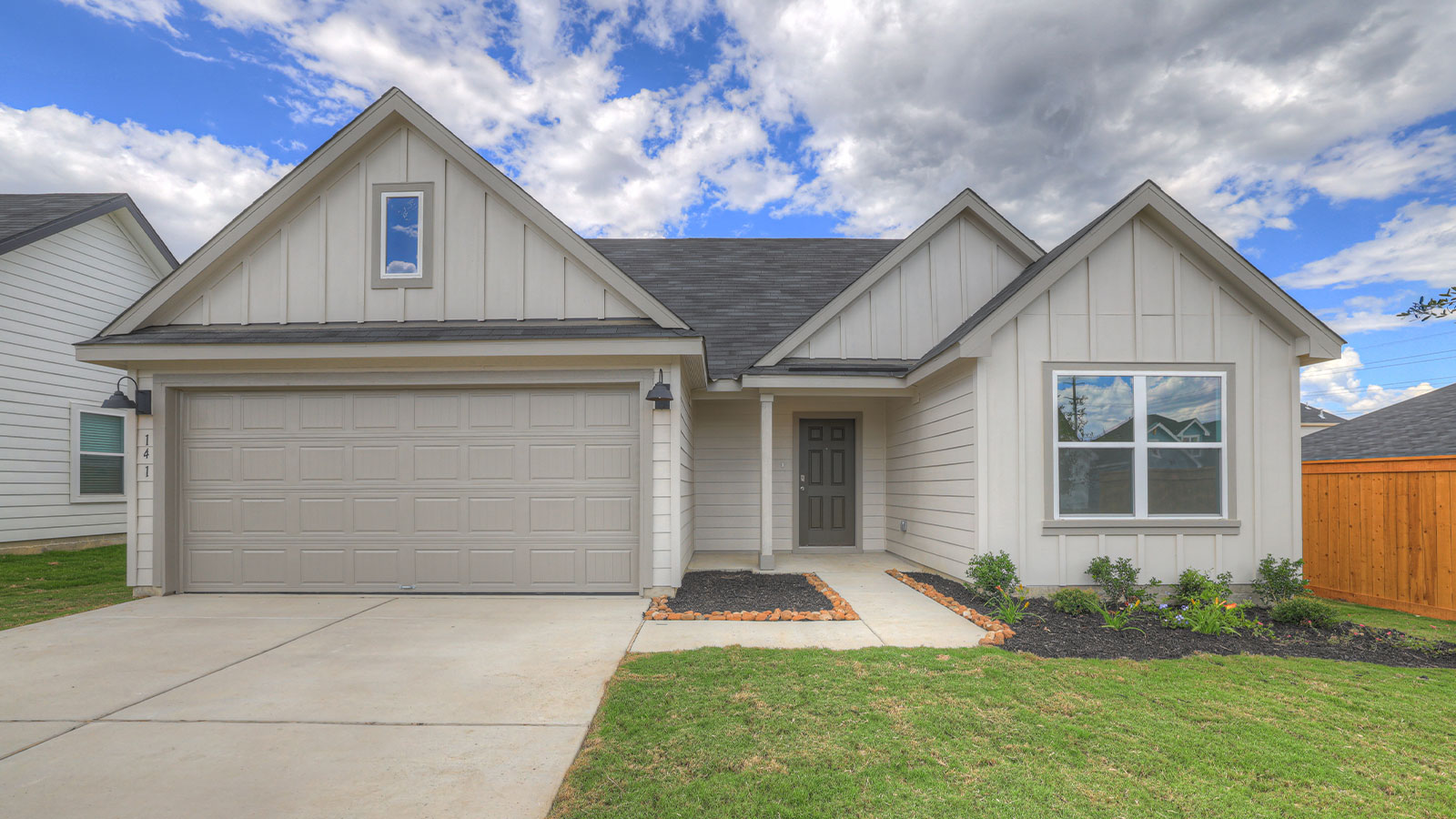 Single-story Denton F elevation with farmhouse exterior, 2 windows, and a 2 car garage.