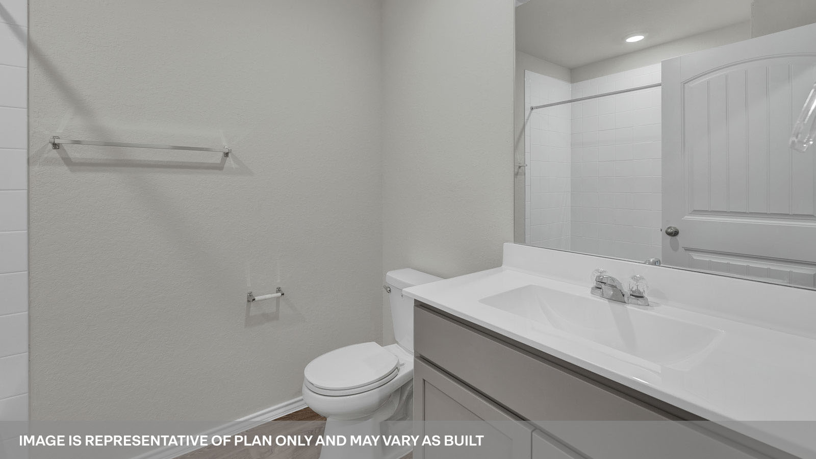 Hall bathroom with single sink vanity, and toilet