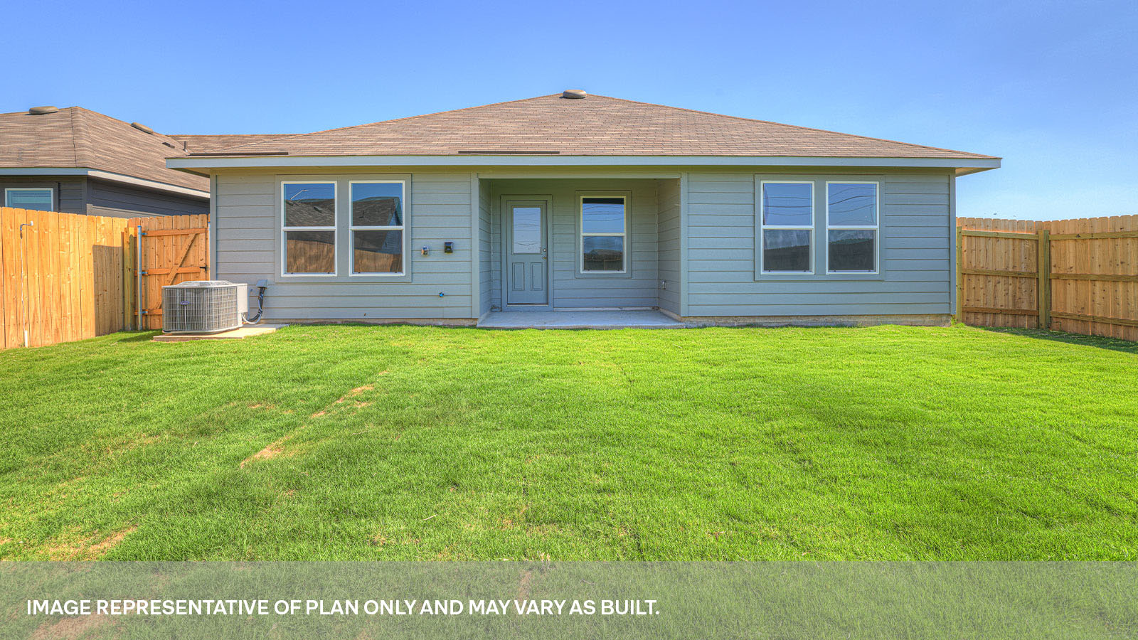 Covered patio with fully sodded backyard and privacy fence.