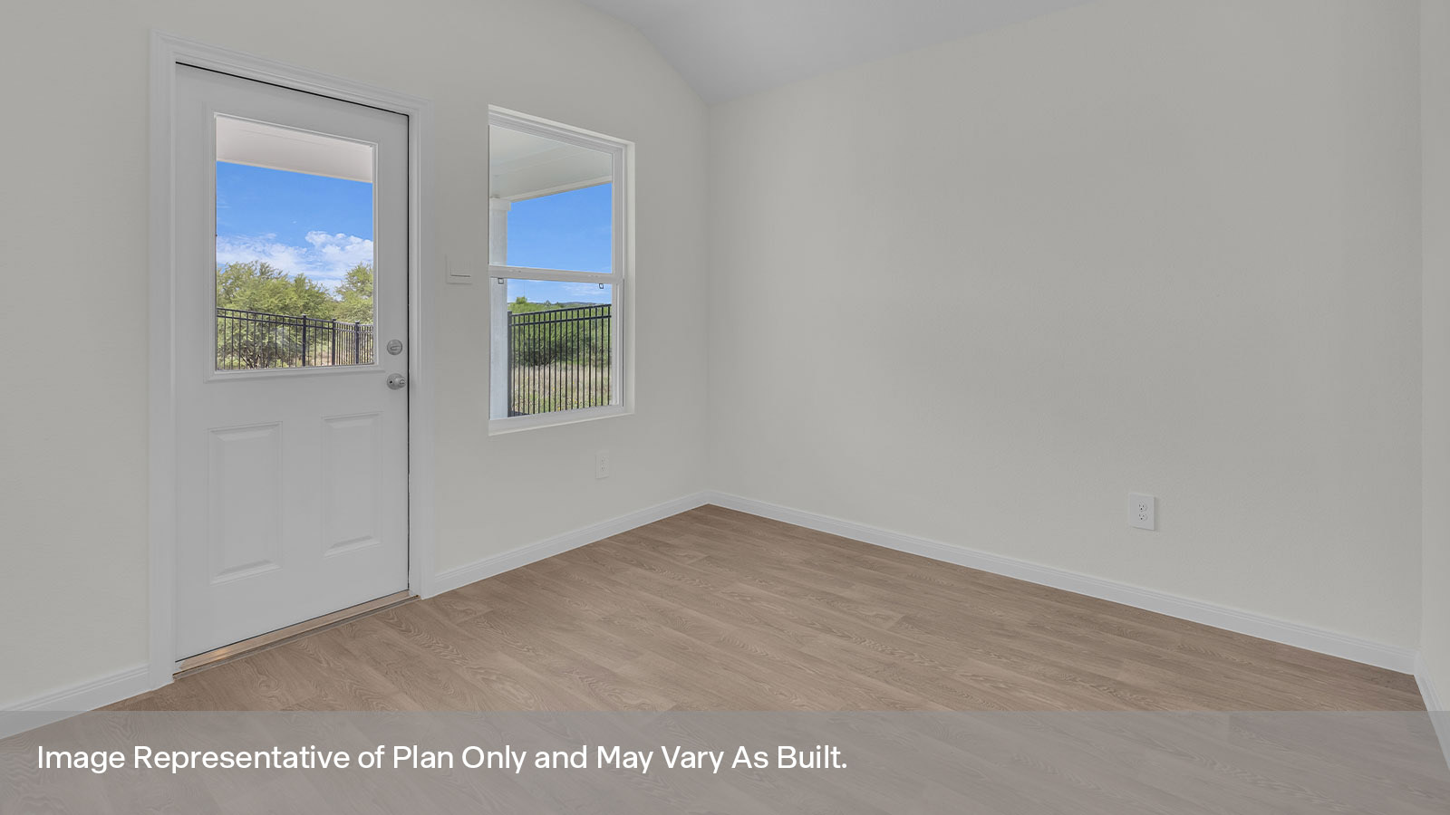 Dining room with vinyl flooring, one window, and a half lite exterior door.