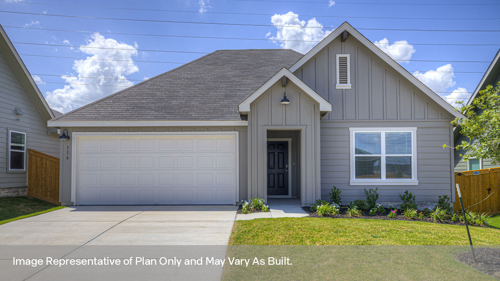Single-story farmhouse exteriors with windows and a 2 car garage.