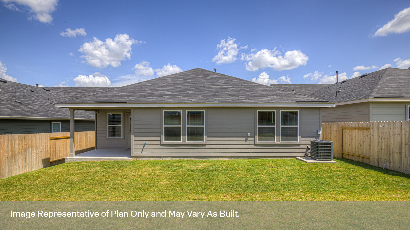 Covered patio with fully sodded backyard and privacy fence.