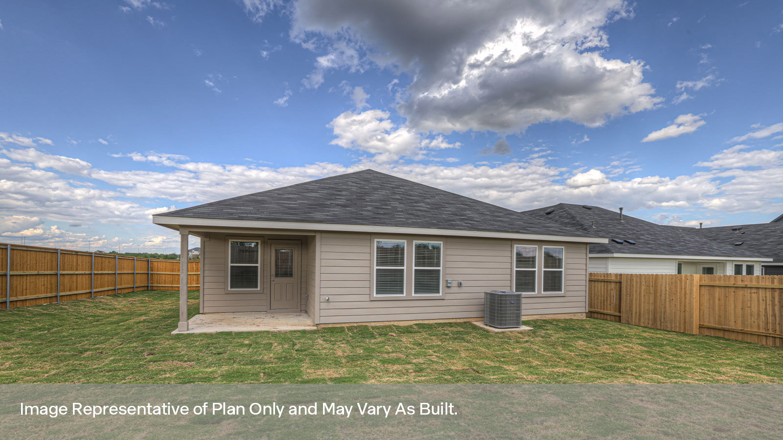 Covered patio with fully sodded backyard and privacy fence.