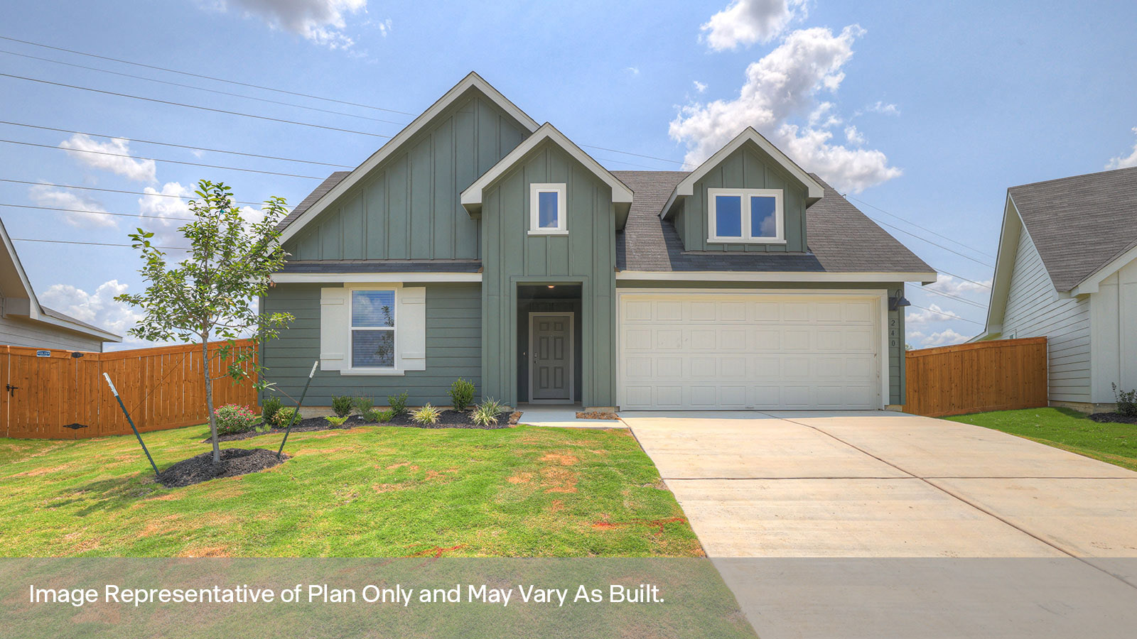 Single-story with farmhouse exteriors, one window, and 2 car garage.