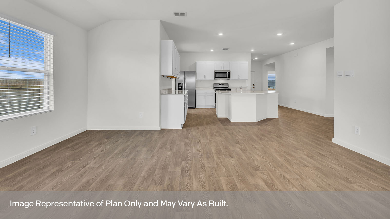 Dining room opening to the kitchen.