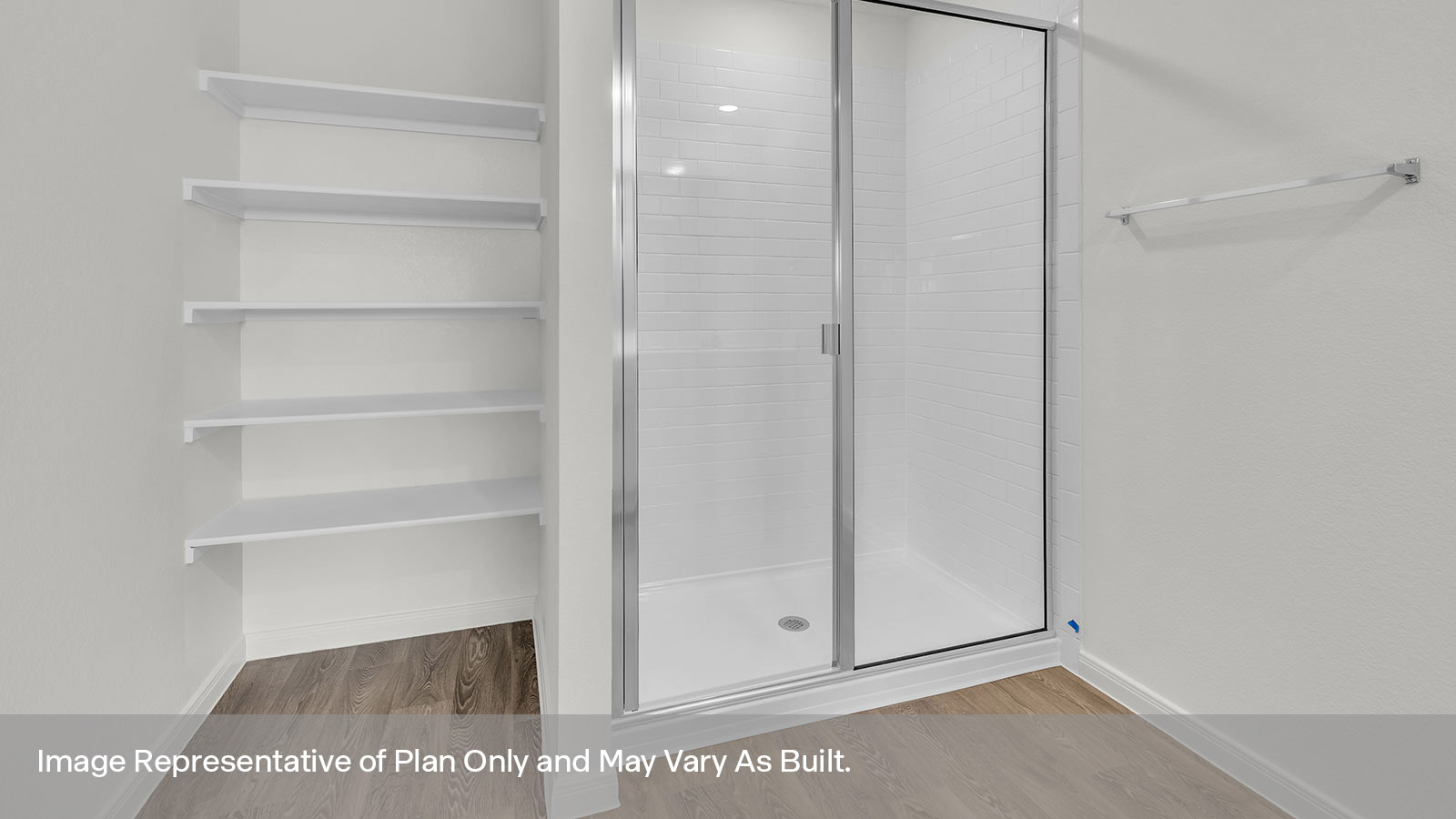 Main bathroom with double sink vanity and large walk-in shower and shower glass door.