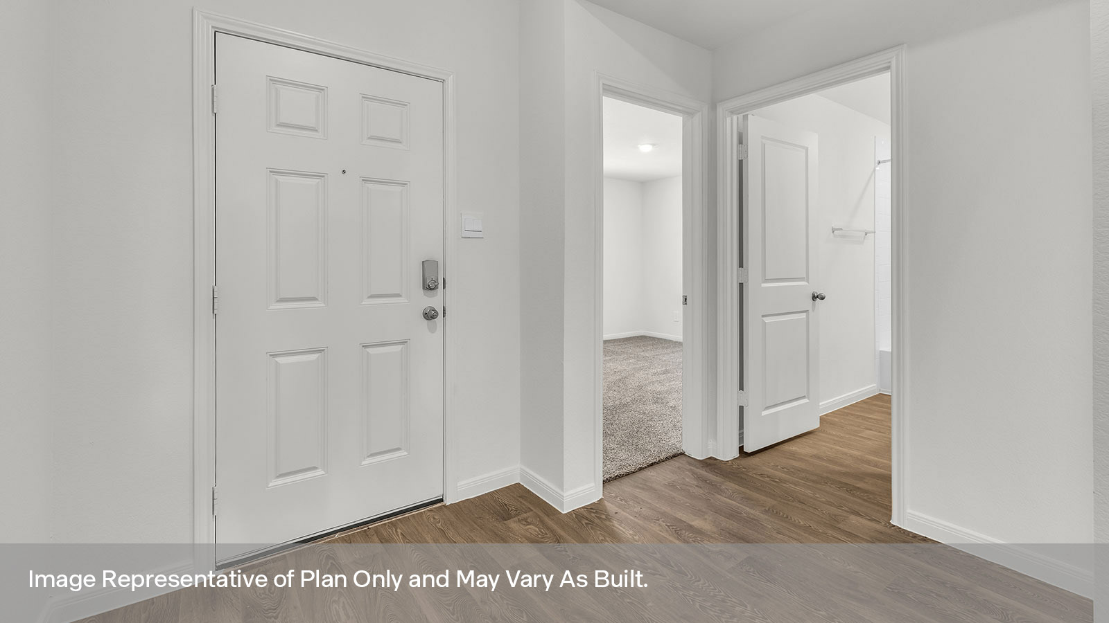 Main bathroom with double sink vanity and large walk-in shower and shower glass door.