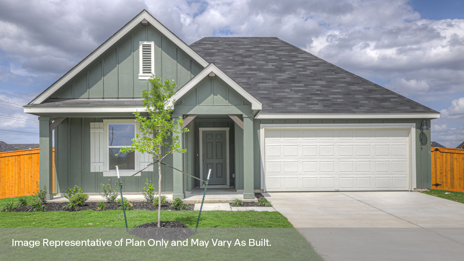 Single-story farmhouse exteriors with 2 car garage.