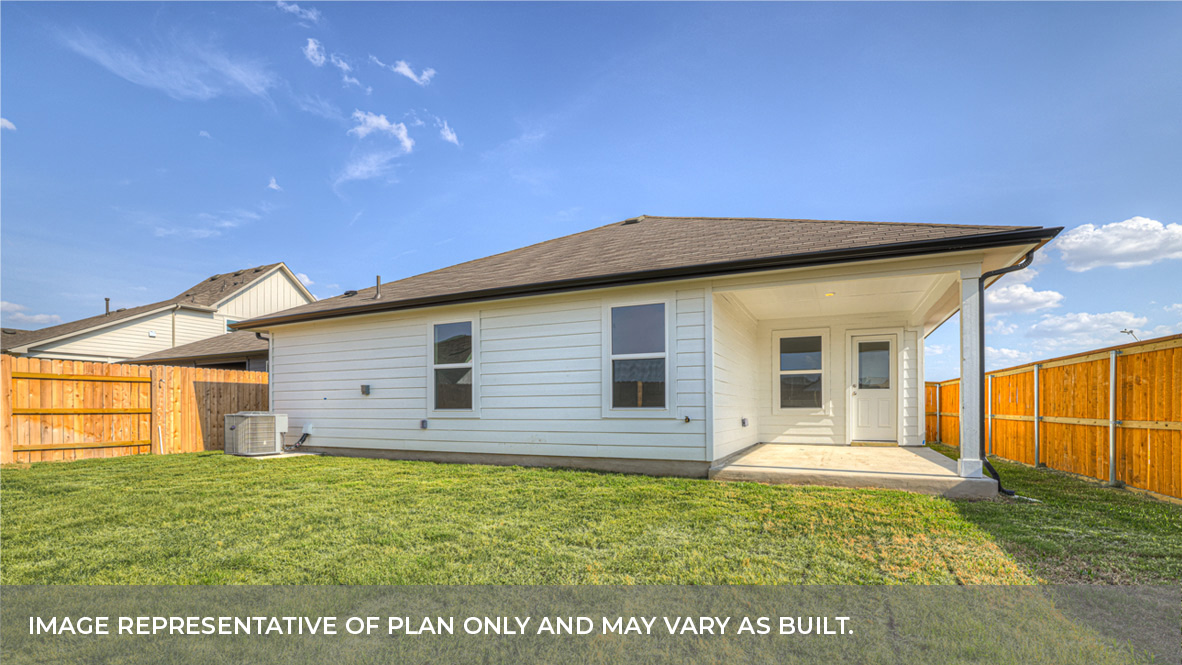 Covered patio with fully sodded backyard and privacy fence.