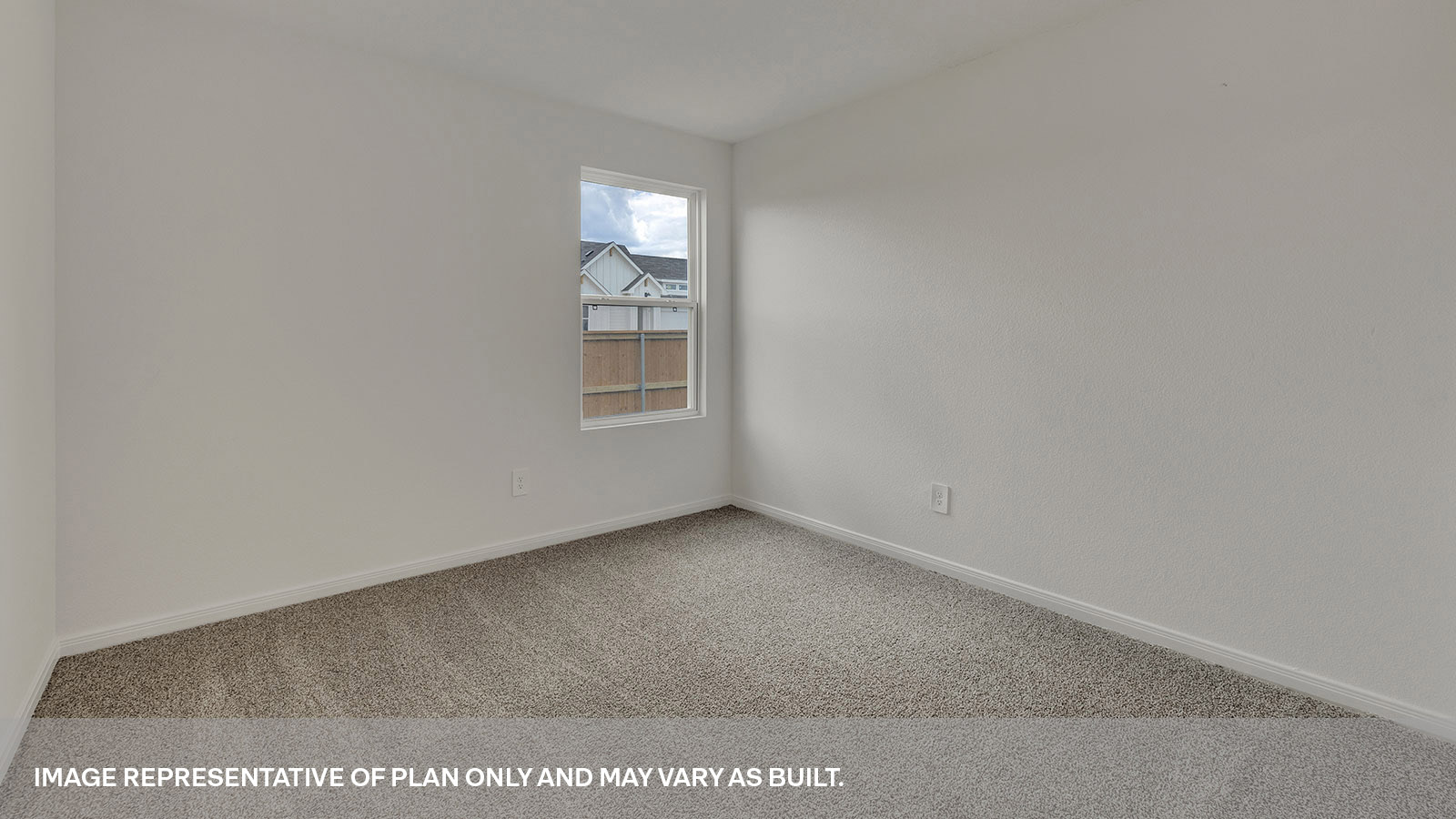 Study with carpeting and one window.