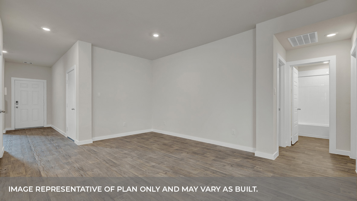 Entry hallway with vinyl flooring leading to the bedroom area.