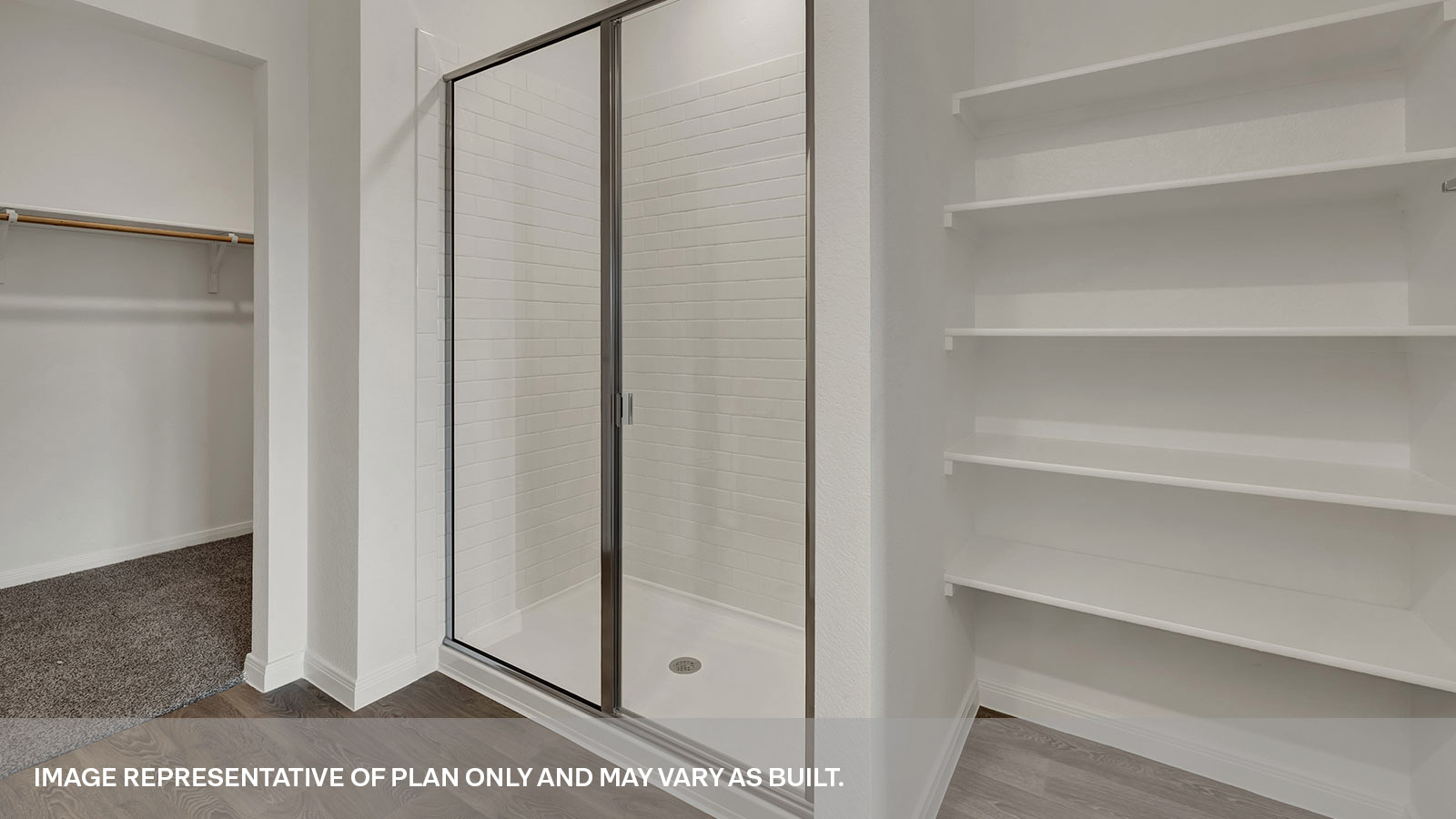 Main bathroom with wooden shelving and a walk-in shower with shower glass door.