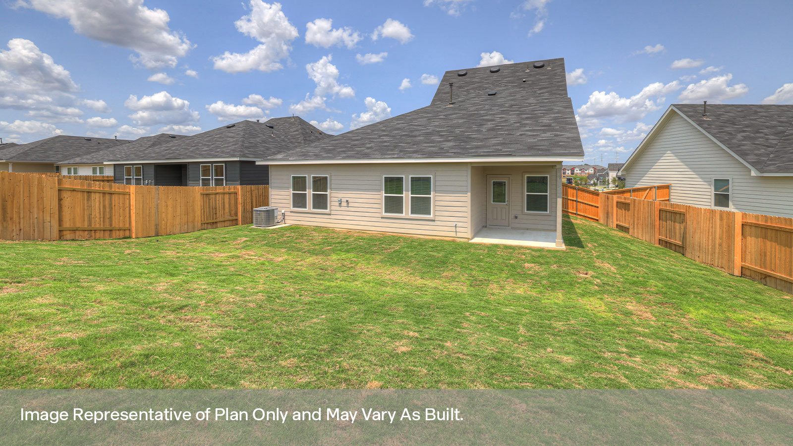 Covered patio with fully sodded backyard and privacy fence.