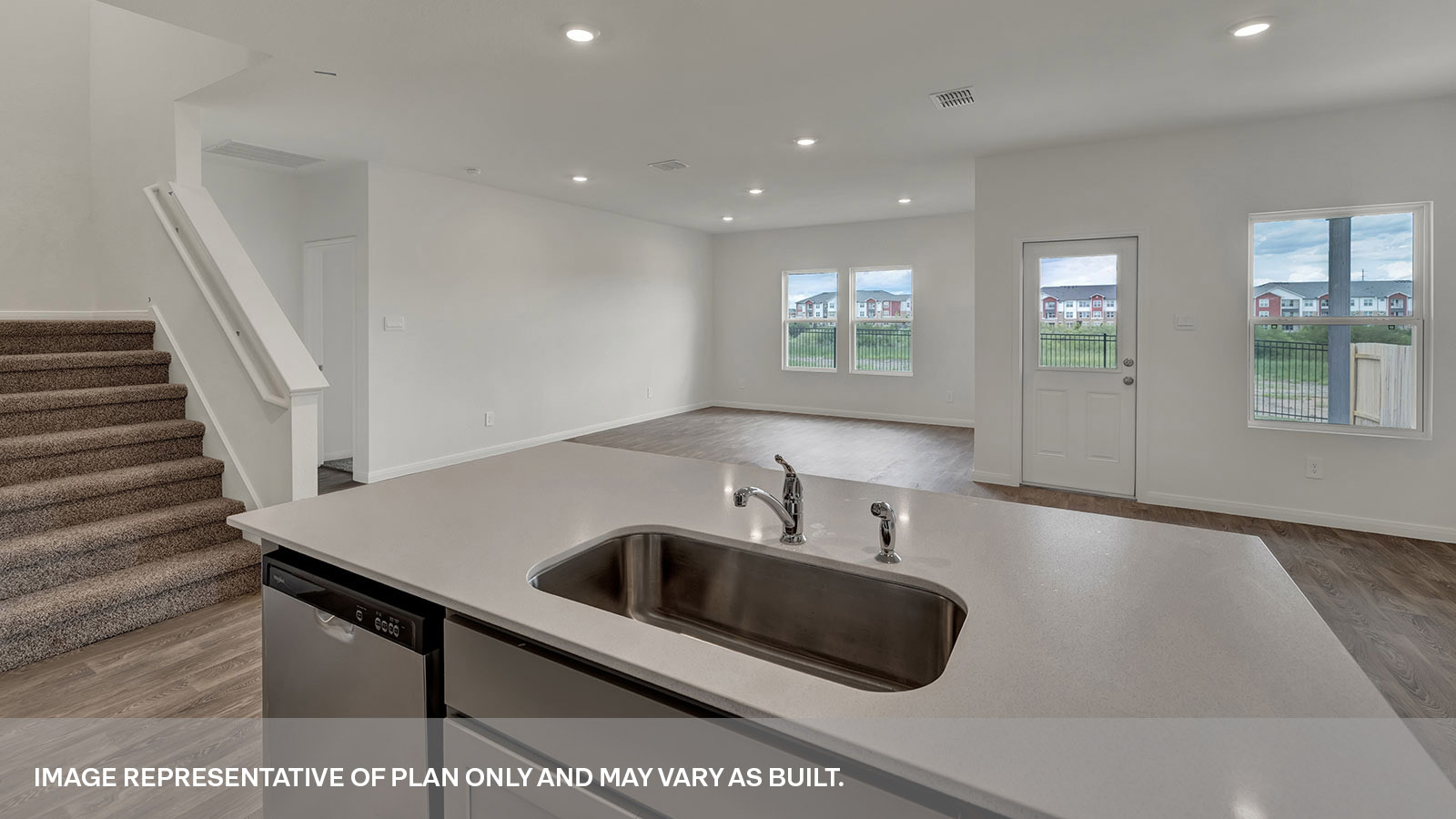 Kitchen island overlooking the dining room and living room.