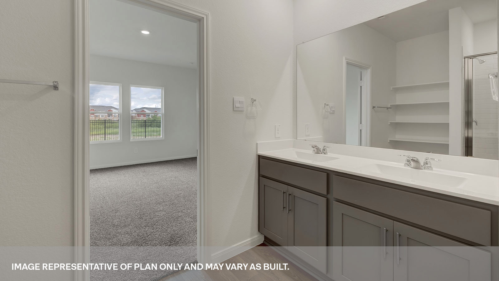 Main bathroom with double sink vanity and cabinet.