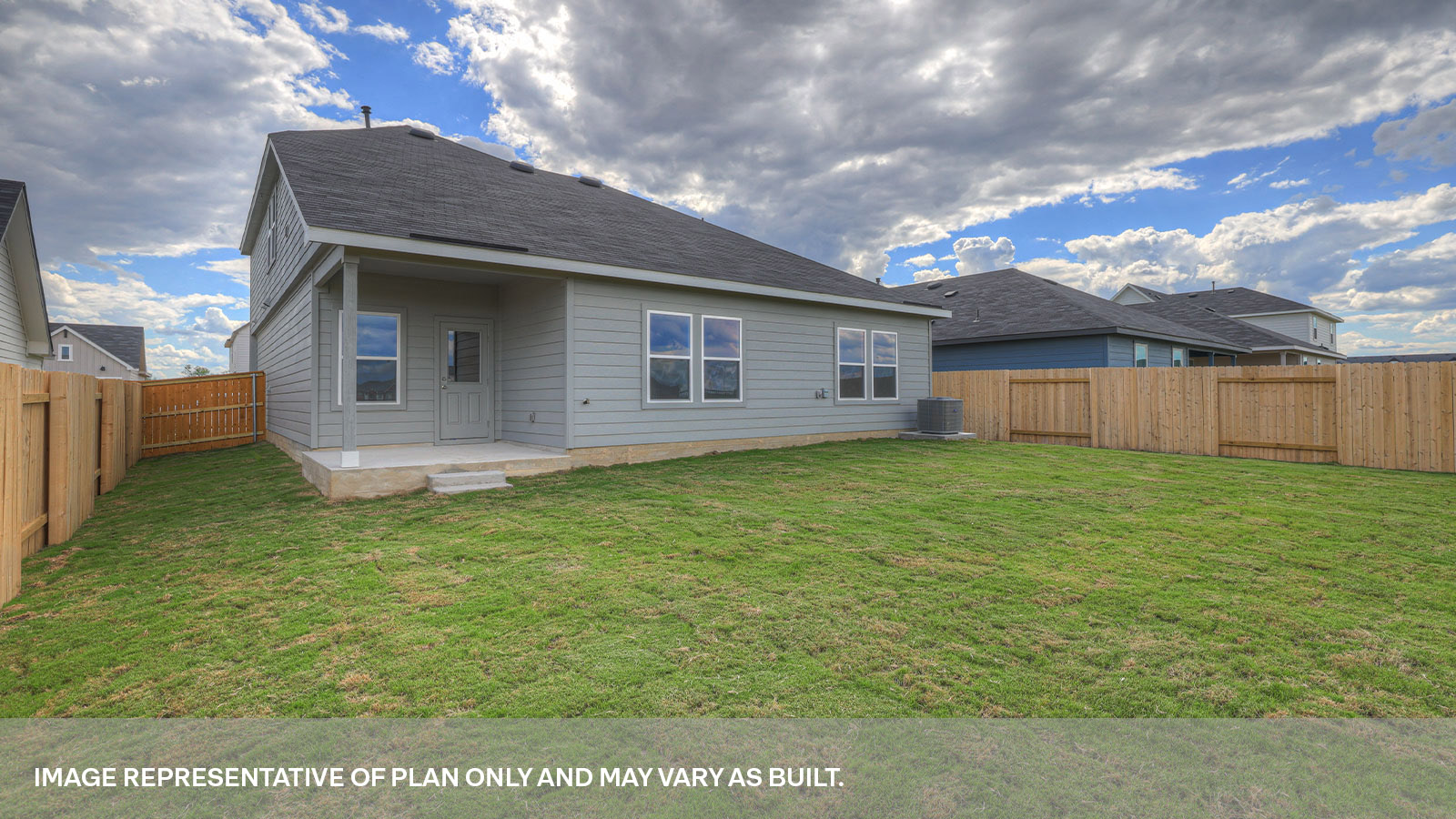 Covered patio with 5 windows, half lite exterior door, and fully sodded backyard.