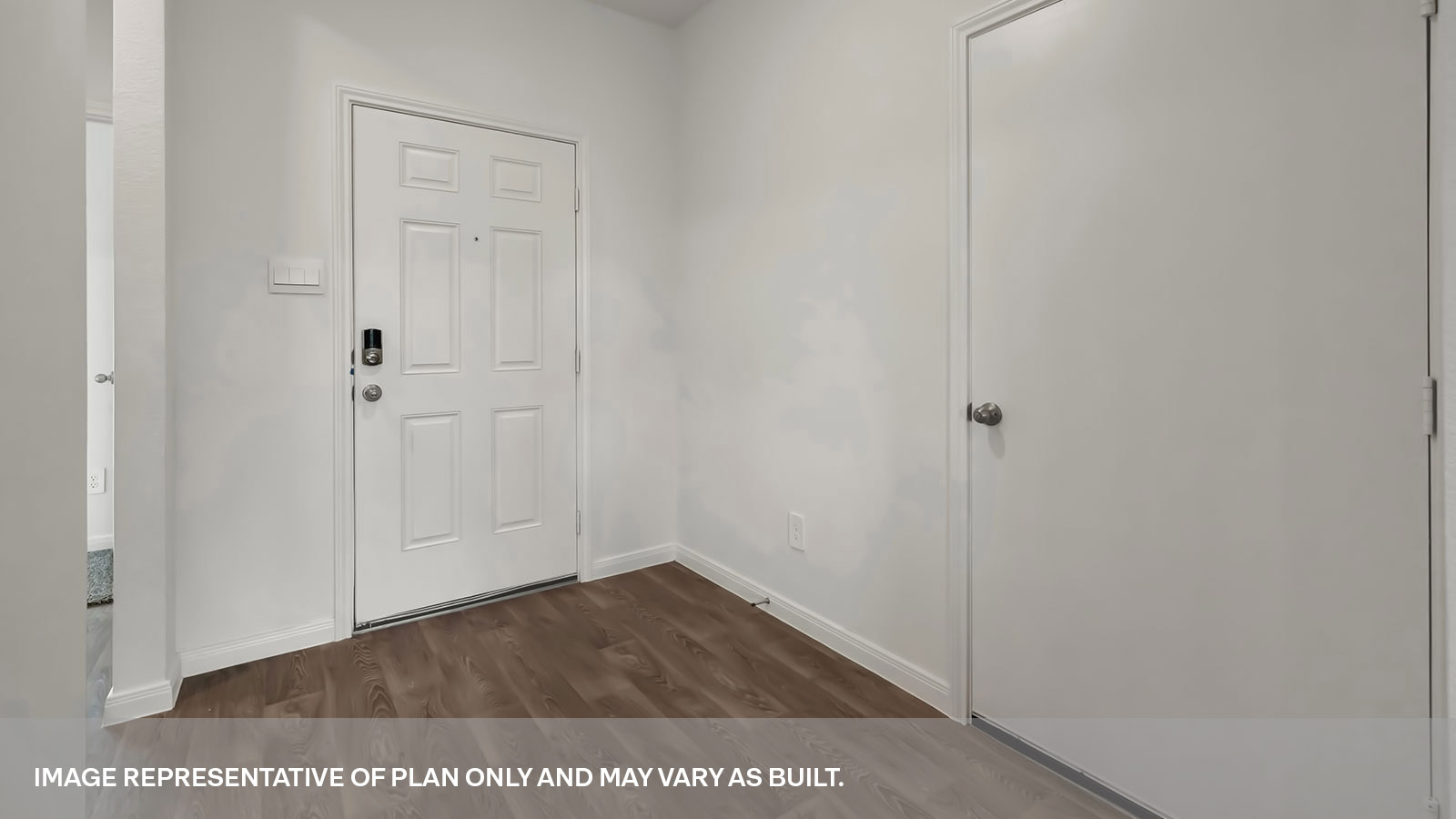 Entryway hallway entry with front door.