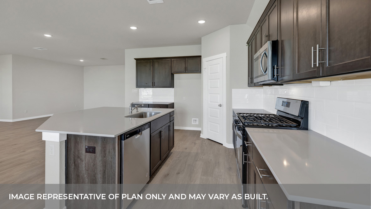 Sonoma Oaks  Frisco Floorplan Kitchen Island and Dining Room