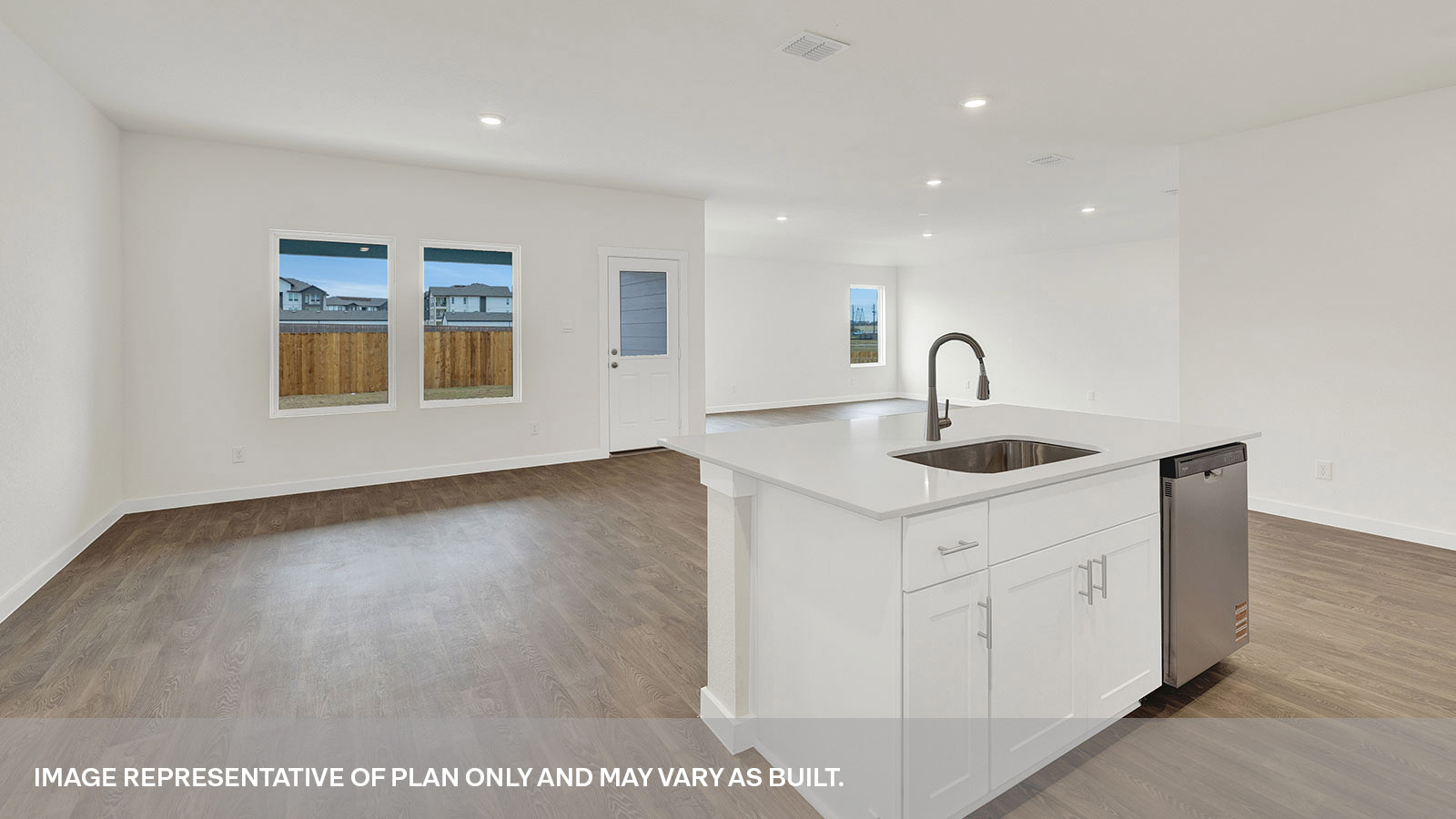 Sonoma Oaks Garland Floorplan Kitchen Island and Dining Room and Family Room
