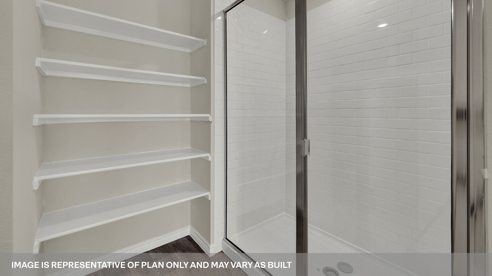 Main bathroom with walk-in shower and shower glass door.
