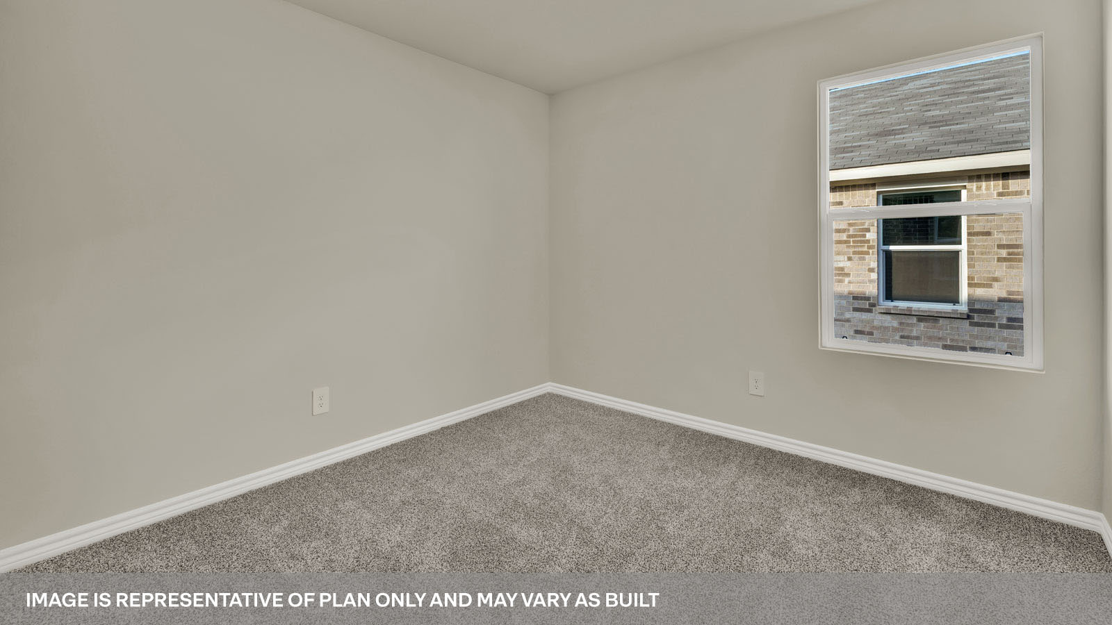 Bedroom with carpeting and one window.