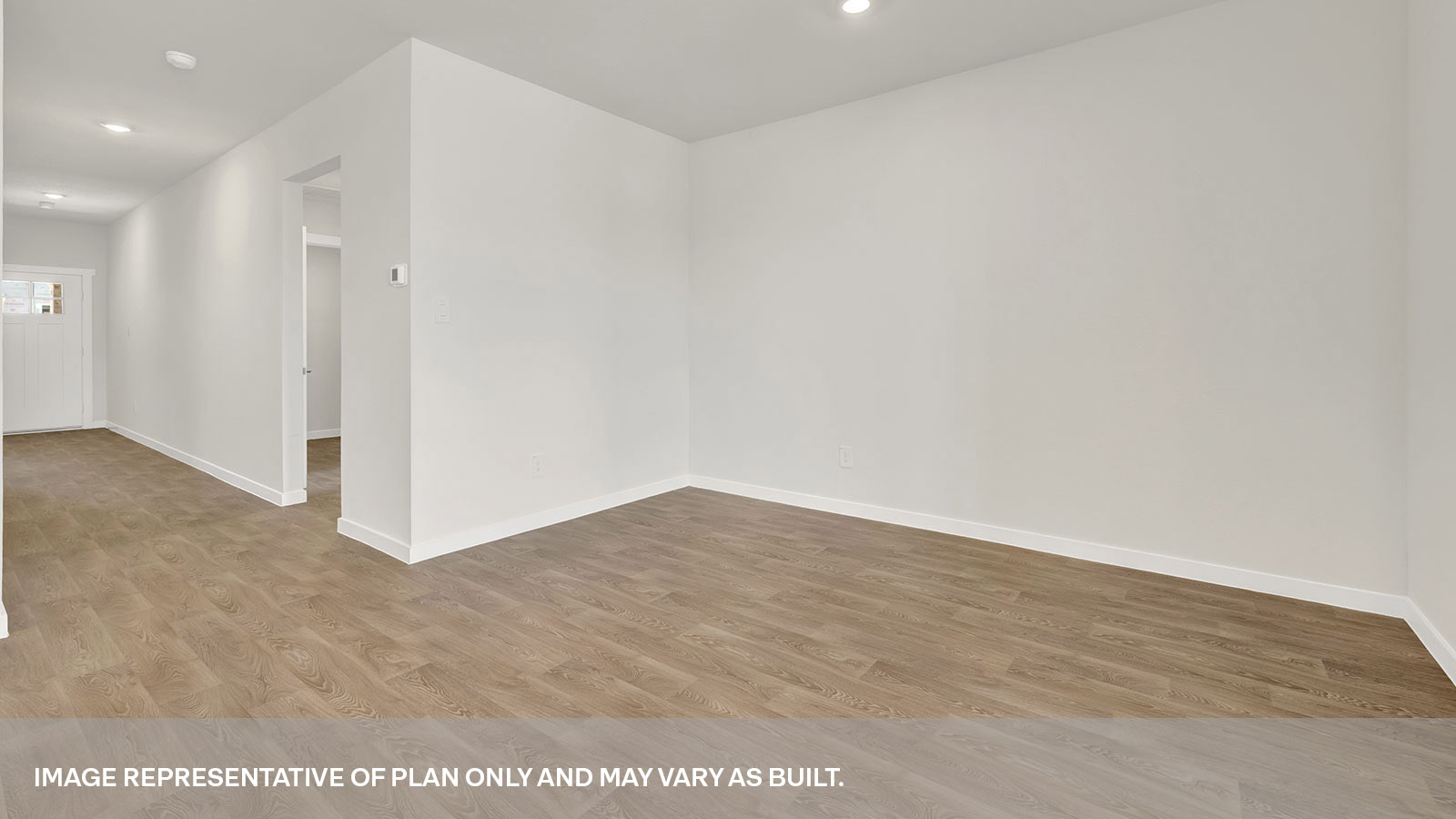 Dining room with vinyl flooring.