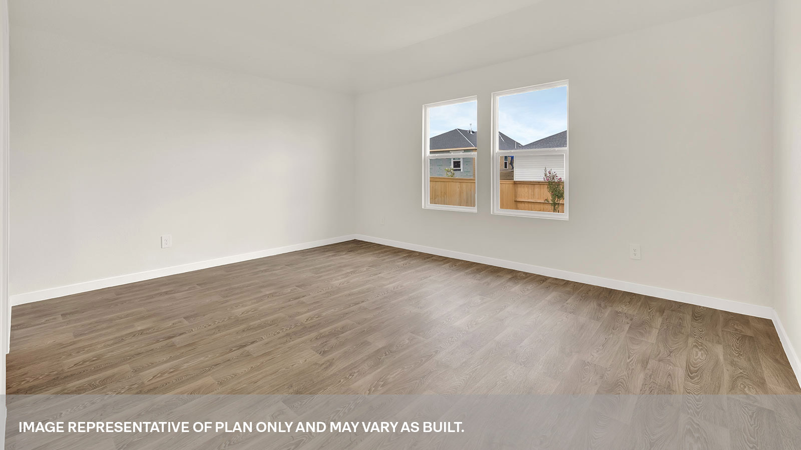 Main bedroom with vinyl flooring and two windows.
