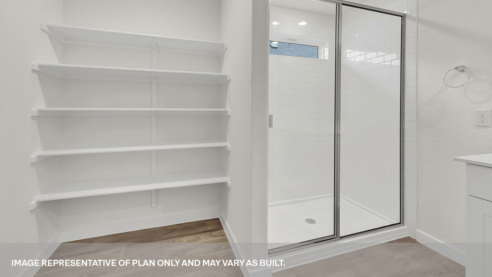 Main bathroom with walk-in shower and wooden shelving.