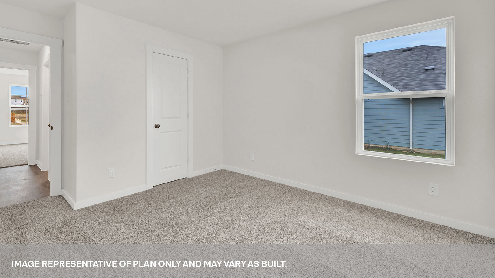 Secondary bedroom with carpeting and one window.