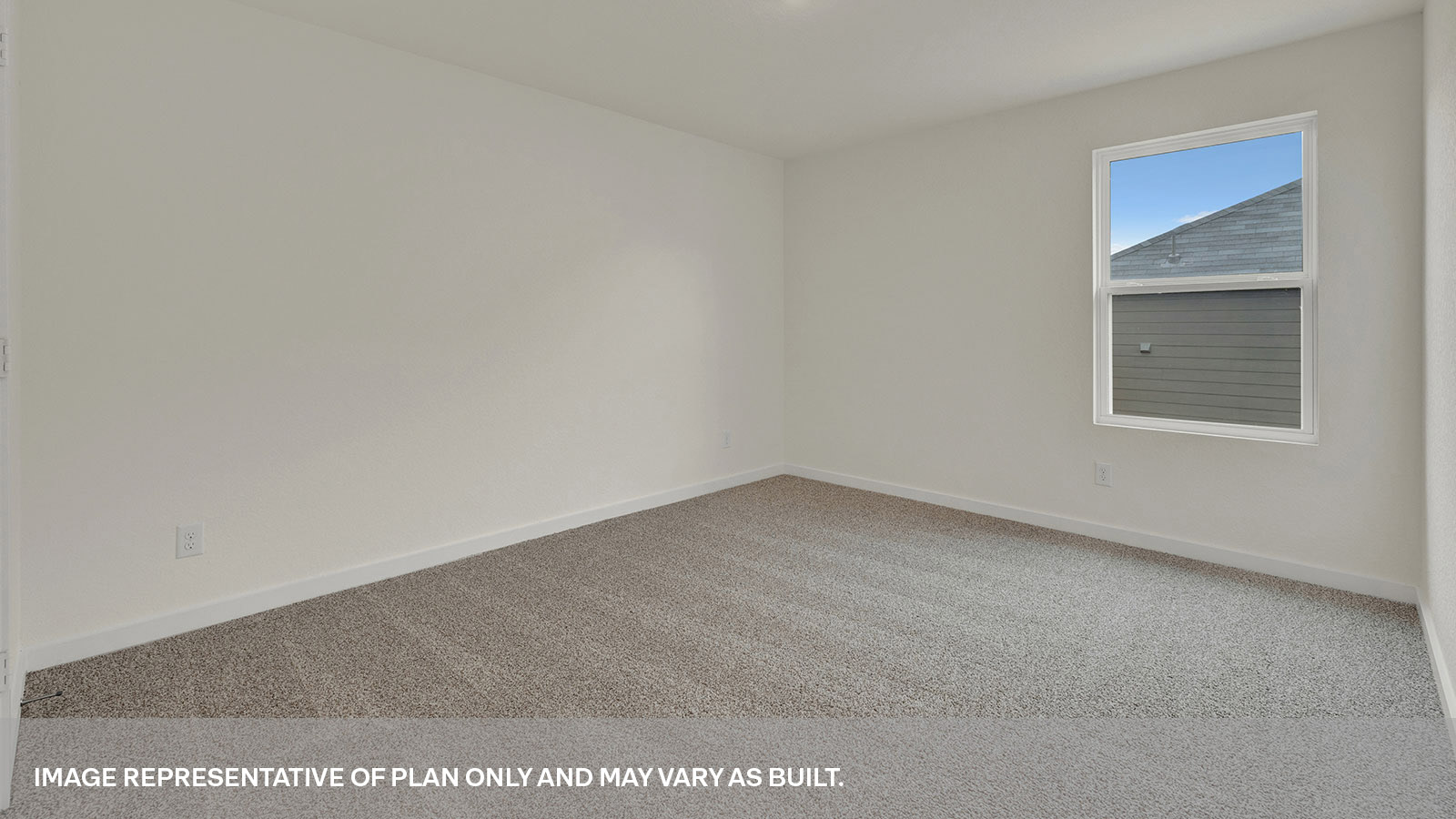 Secondary bedroom with carpeting and one window.