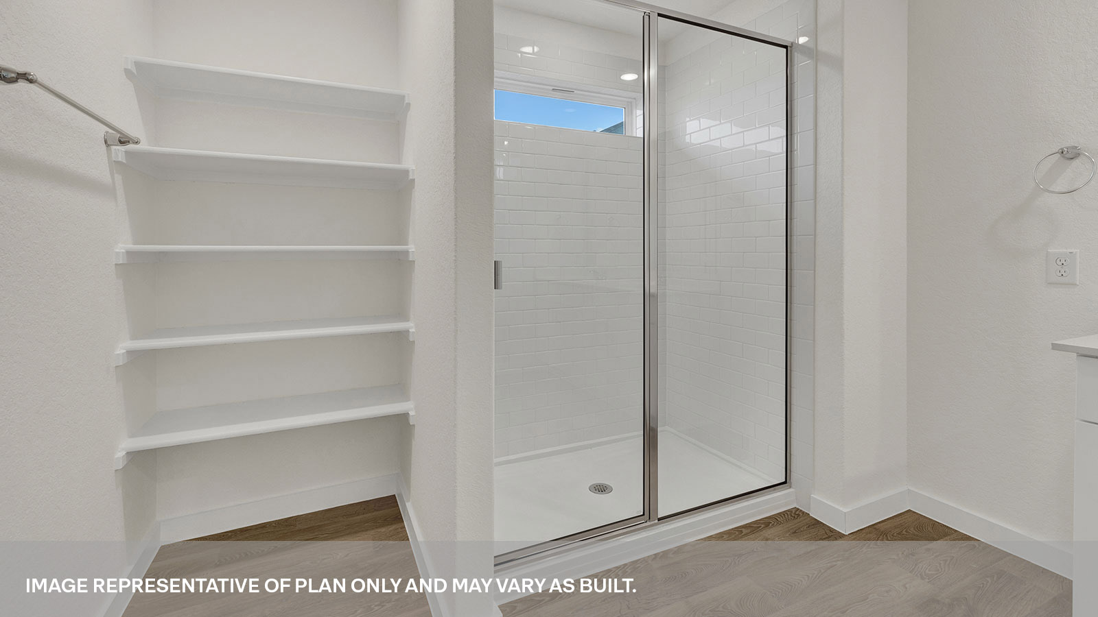 Main bathroom walk-in shower with shower glass door.