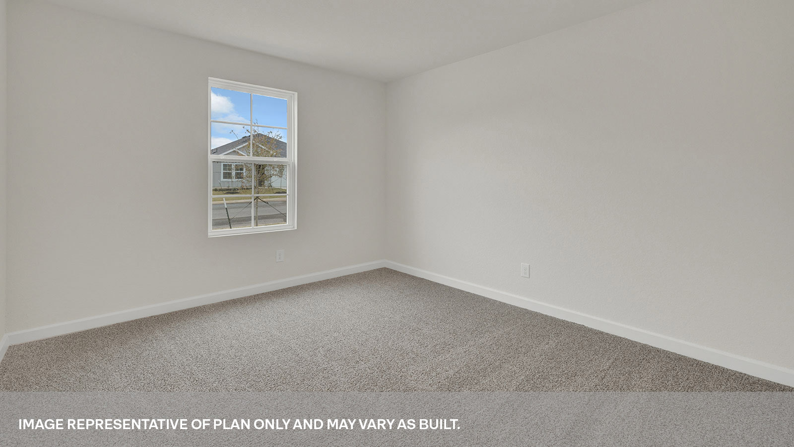 Front bedroom with carpeting and one window.