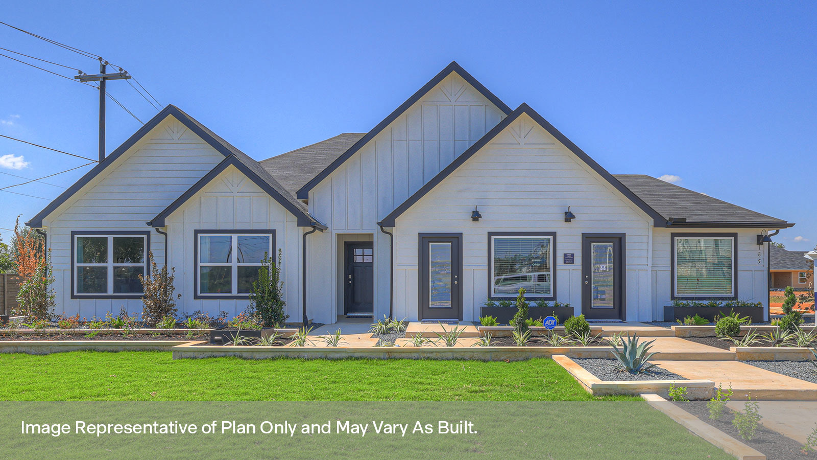 The Irving floorplan G elevation with 3 car garage rendering.