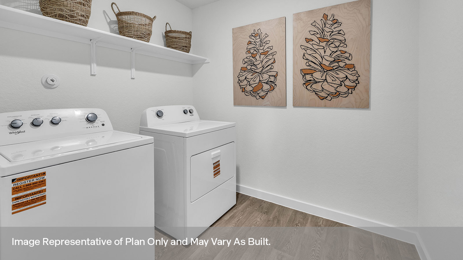 Laundry room with washer/dryer and wooden shelving.